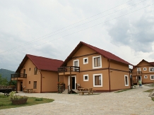 Rural accommodation at  Pensiunea La Roata